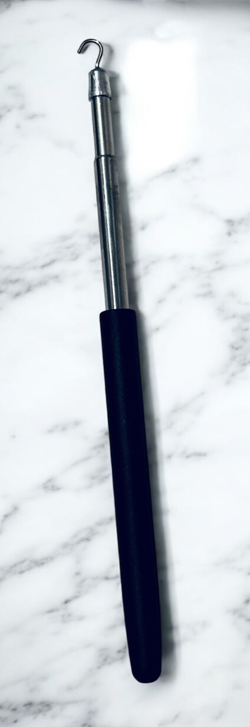 extendable bracelet helper , silver with black handle