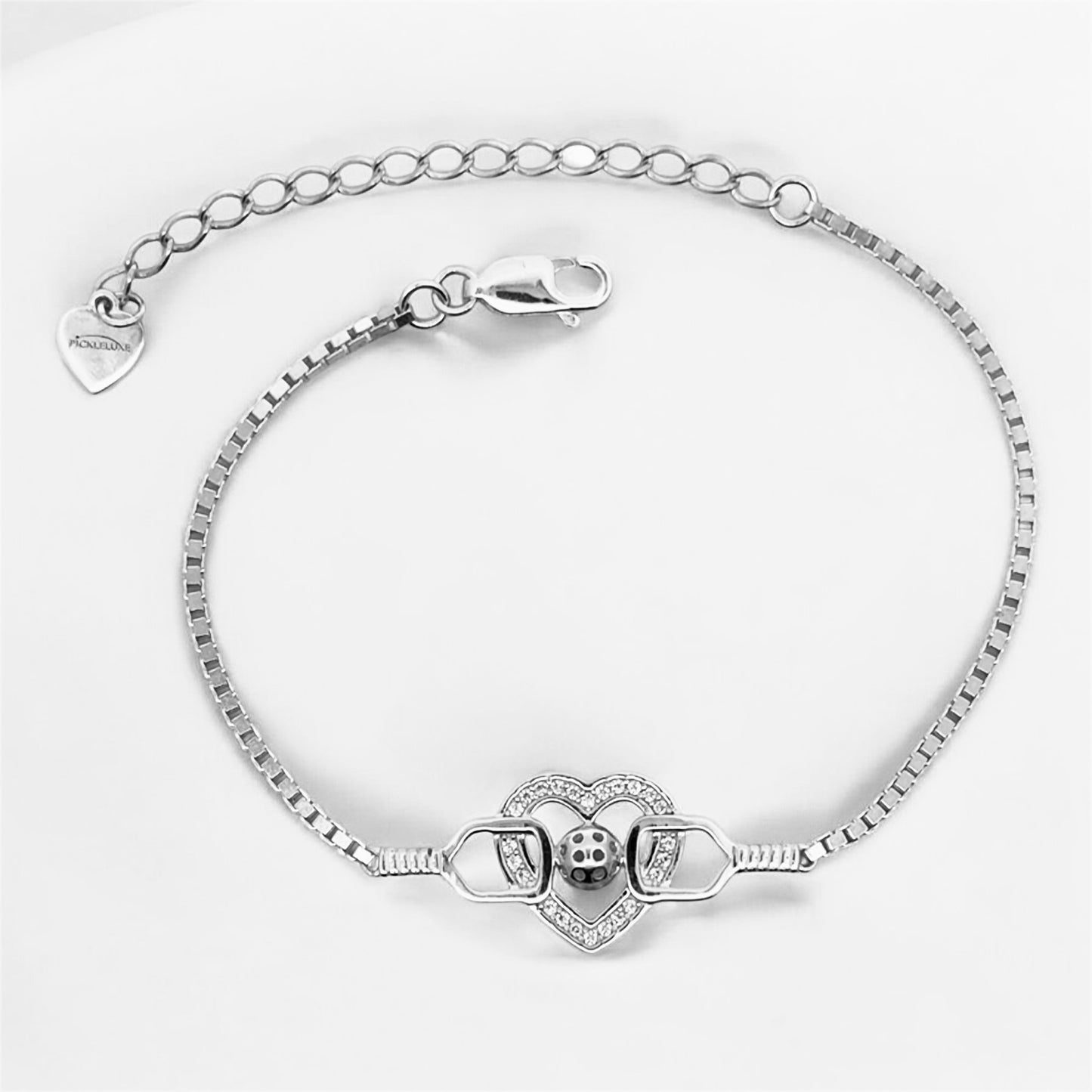 pickleball bracelet with paddles, ball and heart pave' set with cubic zirconia, sterling silver