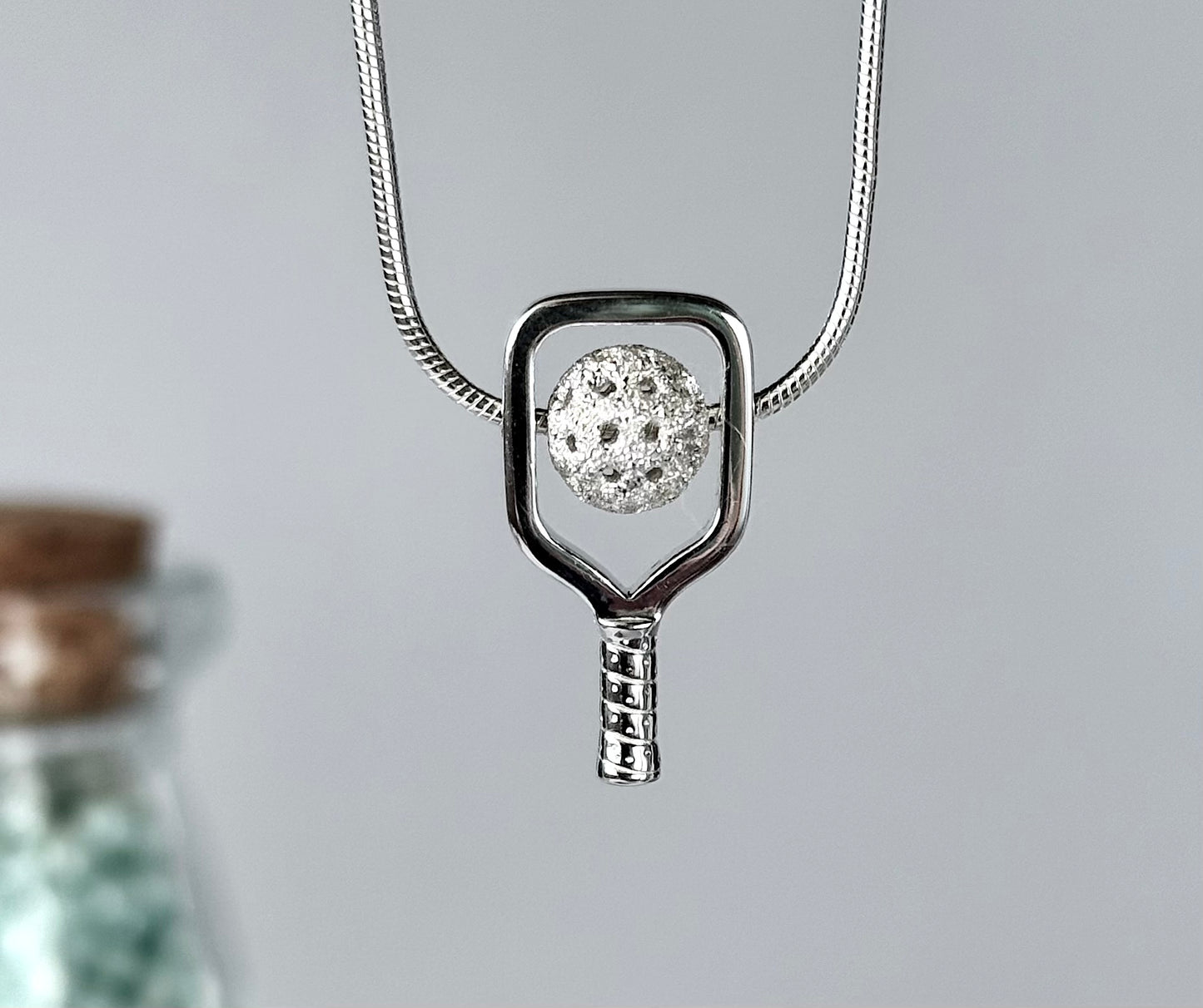 sterling silver pickleball spin necklace with paddle and ball