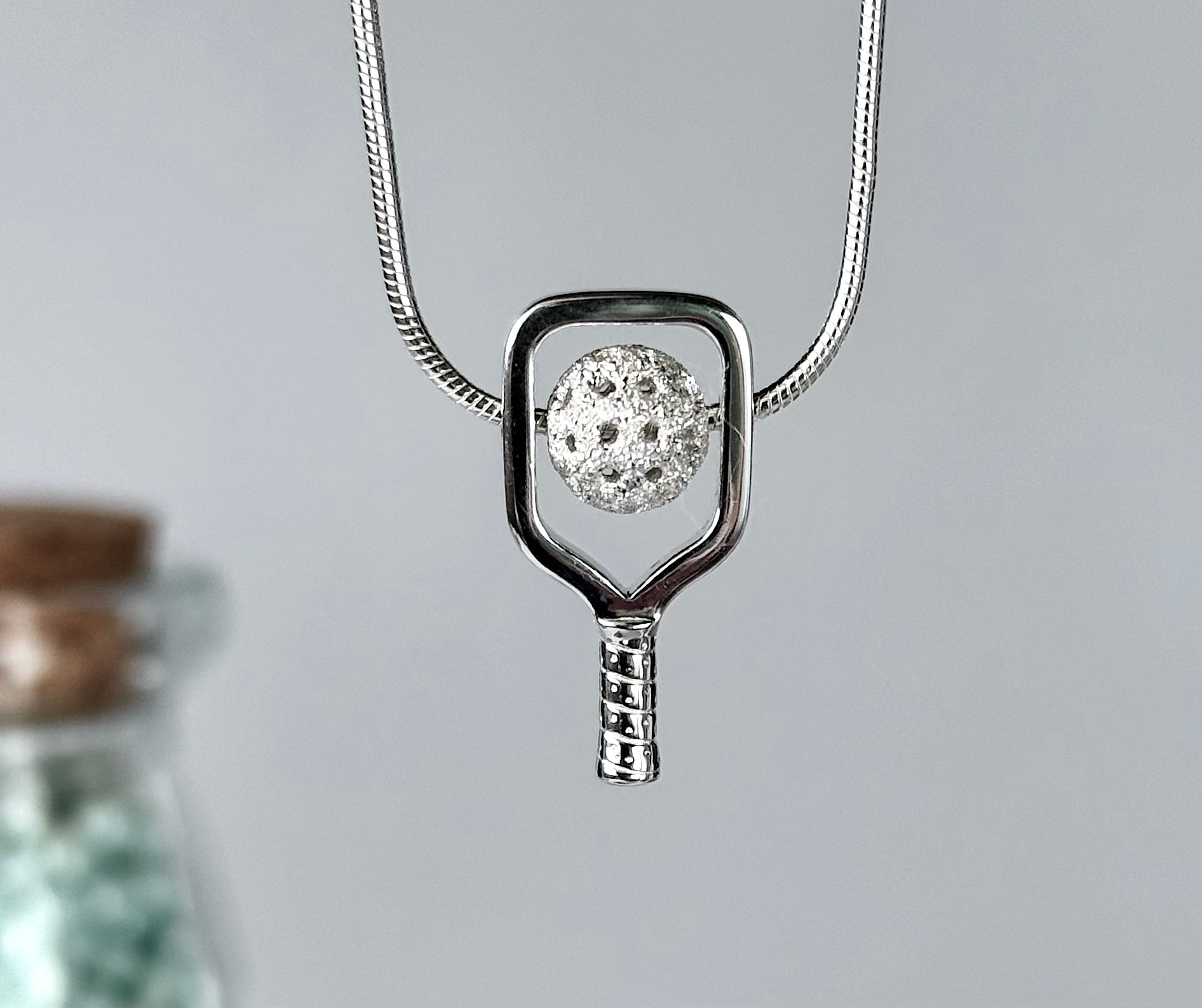 sterling silver pickleball spin necklace with paddle and ball