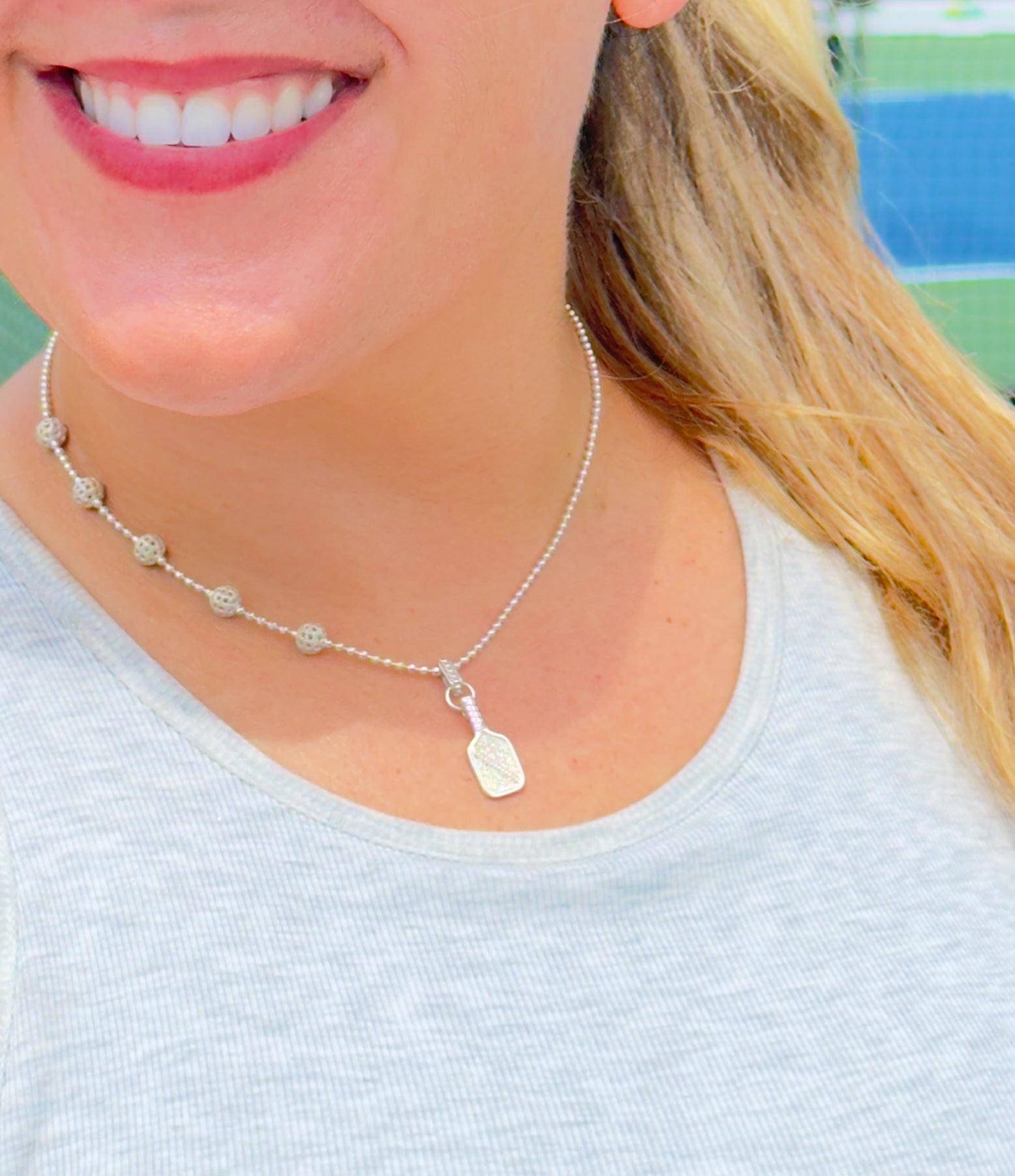 asymmetric pickleball necklace, sterling silver, 5 pickleballs, pickleball paddle