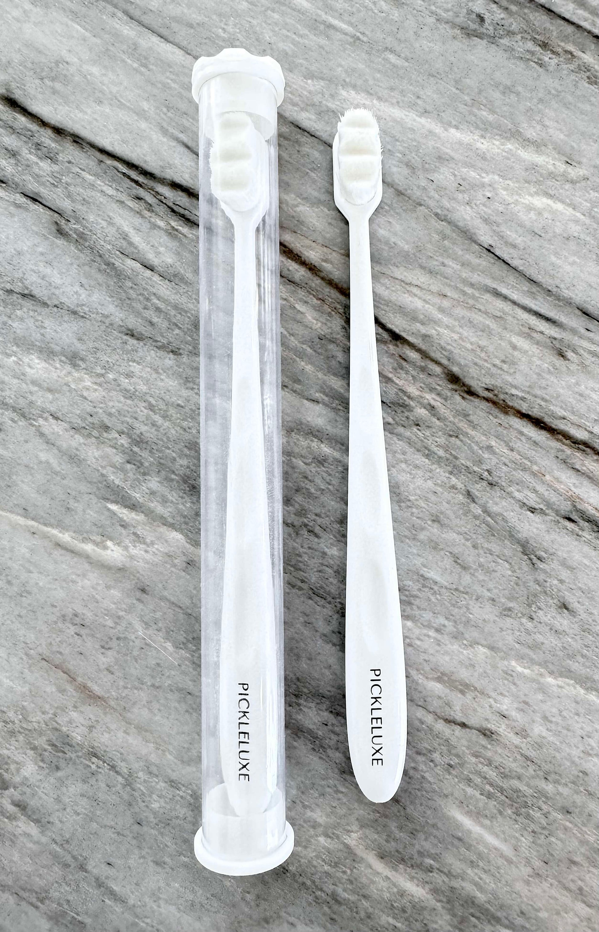 https://pickleluxe.com/cdn/shop/files/jewelry-cleaning-brush.jpg?v=1721181441&width=1946