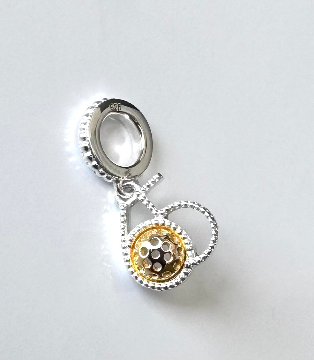 silver pickleball 65 charm with gold ball