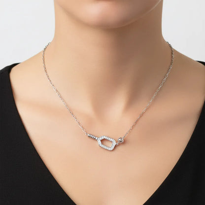 Silver pickleball paddle and ball necklace  on a female model.