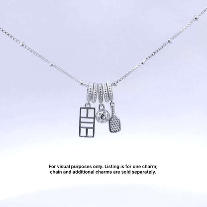 Pickleball charm necklace with ball, paddle, and court in sterling silver for women, kids, and men.