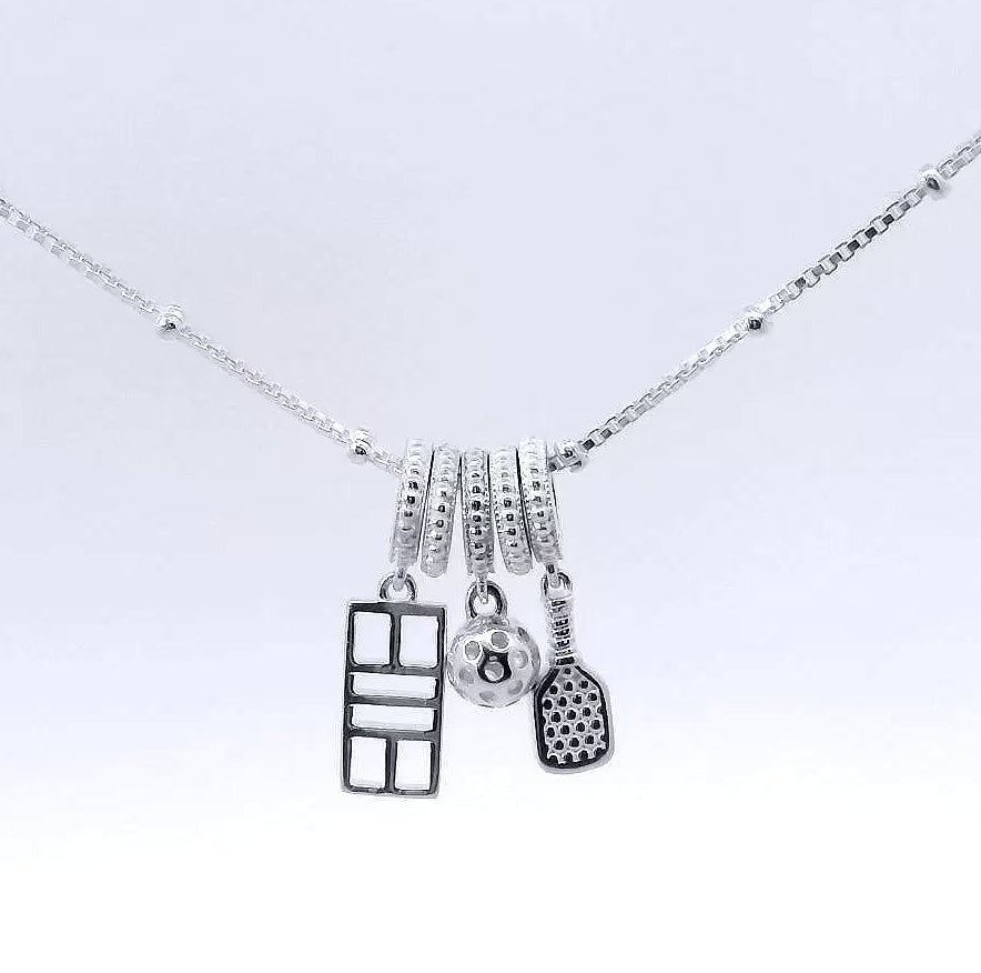 pickleball charm necklace with charm trio of paddle, ball, court, sterling silver