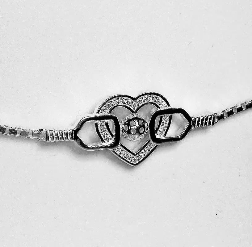 sterling silver pickleball bracelet with paddles, ball and heart pave' set with cubic zirconia
