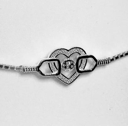sterling silver pickleball bracelet with paddles, ball and heart pave' set with cubic zirconia